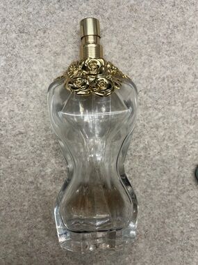 Refillable glass Paul Gaultier Clear Glass Torso Spray Bottle with Gold Rose